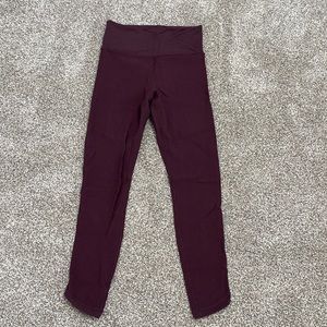 Athleta elation 7/8 tight size small. Wine color. Ribbed. V-tapered waistband